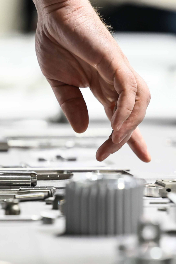 Grinding wheel abrasive grain structure that determines achievable corner radii in precision grinding.”