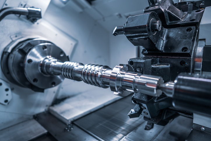 close-up of CNC milling machine (one of tools KMM uses to overcome aerospace manufacturing challenges)