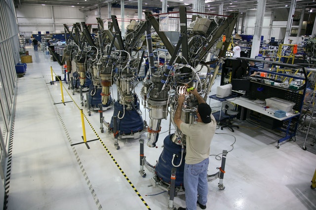 employees working on aerospace manufacturing floor
