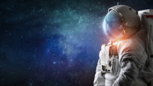 astronaut in space suit against galactic background