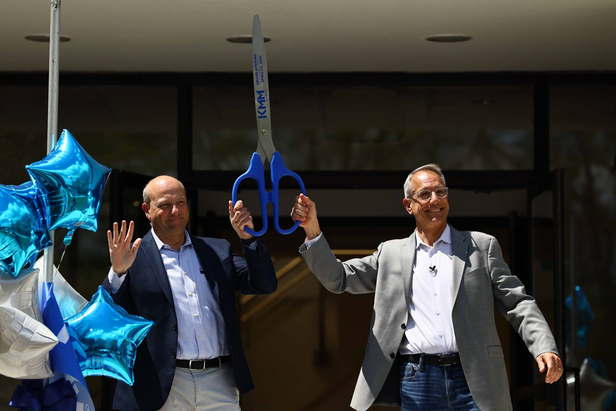 KMM Unveils New Global HQ in Spectacular Ribbon-Cutting Event - KMM